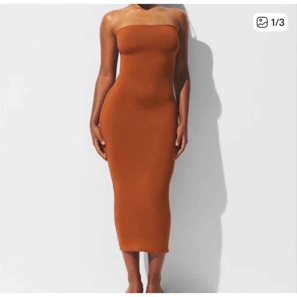 SKIMS Strapless Ribbed Midi Dress in Rust Brown